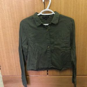 Green button down shirt